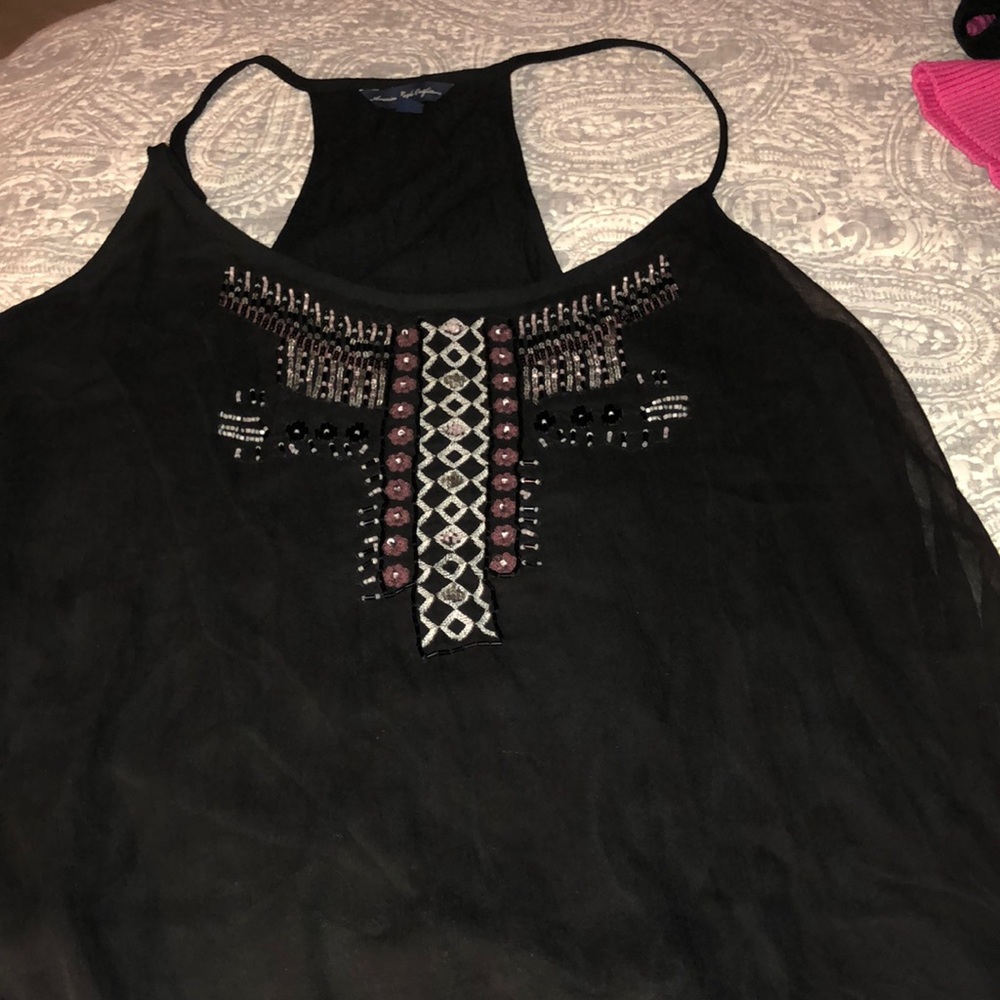 Cute breezy fun top with patterns and beads